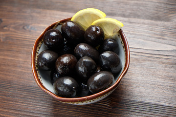 Olives and olives with lemon. menu for catering