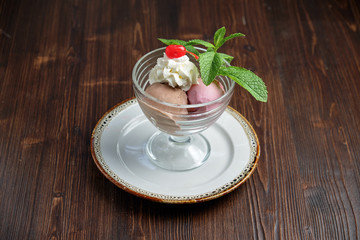 Colored ice cream balls . Restaurant menu
