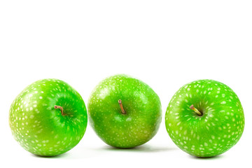 GREEN APPLES ON WHITE BACKGROUND. HEALTHY FOOD