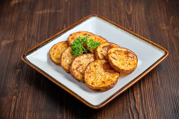 Baked potato with round slices . catering menu