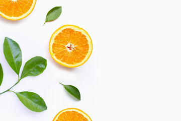 Fresh orange citrus fruit with leaves isolated on white background.