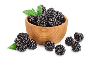 blackberry in bowl with leaf isolated on a white background closeup