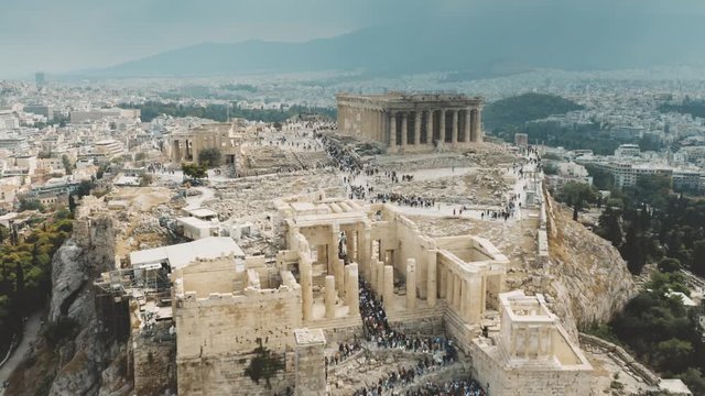 Aerial view of crowded tourist place near the Parthenon temple on Acropolis in Athens, Greece