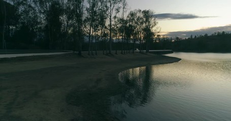 Aerial sunset view of Mina de São Domingos, Tapada Grande River Beach lagoon, famous tourist destination, Alentejo, Portugal.