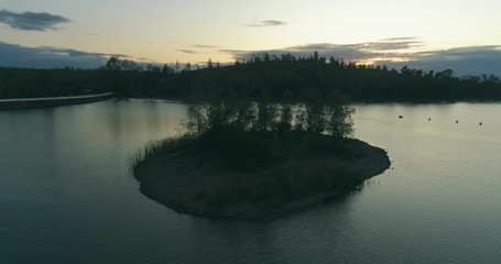 Aerial sunset view of Mina de São Domingos, Tapada Grande River Beach lagoon, famous tourist destination, Alentejo, Portugal.
