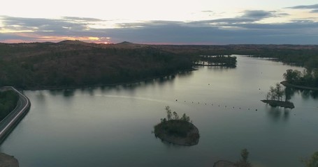 Aerial sunset view of Mina de São Domingos, Tapada Grande River Beach lagoon, famous tourist destination, Alentejo, Portugal.