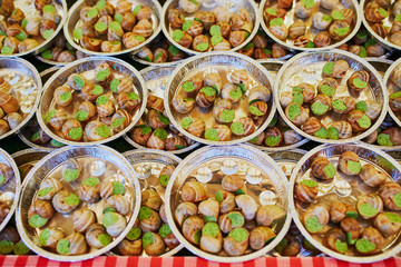 snails with garlic butter on traditional Christmas market