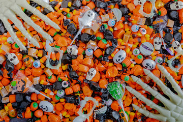 Halloween candy spilled out on table