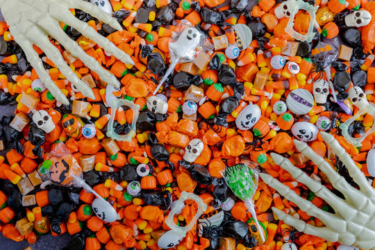Halloween candy spilled out on table