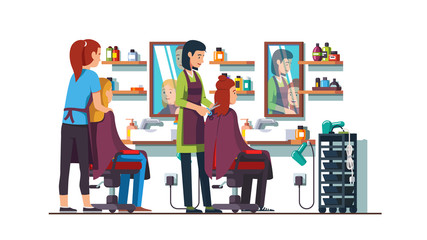 Women hairdresser making haircut in beauty salon