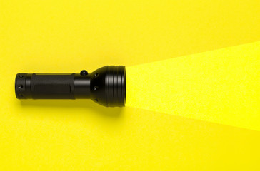 Flashlight or torch lighting up background - minimal concept for internet search or direction...
