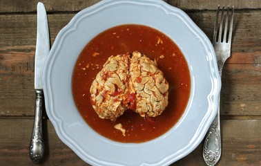 spooky halloween food. brains of a cow, sheep or calf in tomato sauce. dishes with offal. dish for Halloween. 