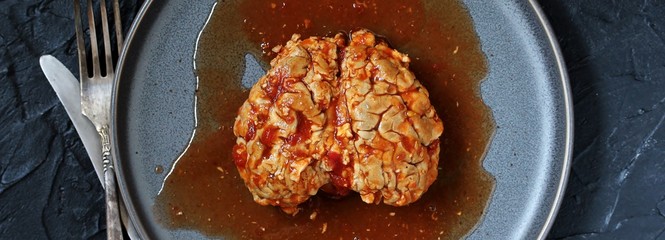 spooky halloween food. brains of a cow, sheep or calf in tomato sauce. dishes with offal. dish for Halloween. 