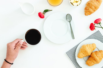 Morning breakfast coffee and croissant