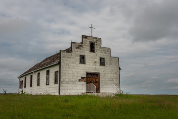 Fototapeta premium Old abandoned church on the Alberta prairies. 