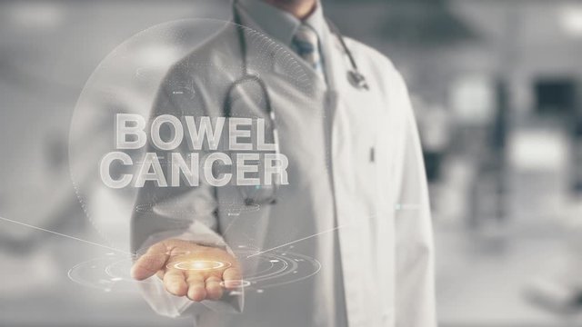 Doctor holding in hand Bowel Cancer