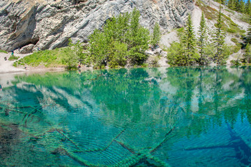 Fototapeta na wymiar Beautiful Grassi Lakes outside Canmore in Kananaskis Country. Grassi Lakes is a very easy and popular hike for families and nature lovers.