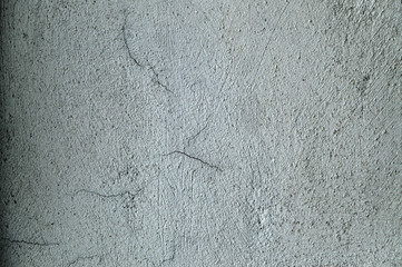 dark rough lime plaster wall