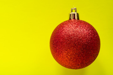 Vintage Ornament Christmas Decoration on bright yellow background. Winter Holidays concept.