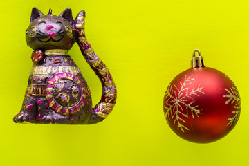 Vintage Ornament Christmas Decoration on bright yellow background. Winter Holidays concept.