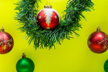 Vintage Ornament Christmas Decoration on bright yellow background. Winter Holidays concept.