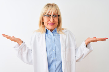 Middle age scientist woman wearing glasses standing over isolated white background clueless and confused expression with arms and hands raised. Doubt concept.