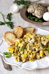 Scrambled eggs with brains of a cow, calf or sheep.The recipe for a dish with brains. Brains are pre-washed and boiled in brine with spices.