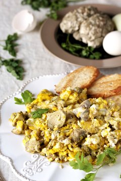 Scrambled eggs with brains of a cow, calf or sheep.The recipe for a dish with brains. Brains are pre-washed and boiled in brine with spices.
