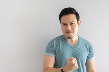 Man bang his fist on his chest as a sign of confidence.