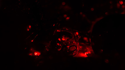 Christmas colorful New Year's Bokeh neon lights. Abstract Blurred photo background with blinking...