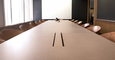 empty meeting room with white screen.