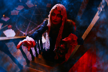 terrible witch with a lantern