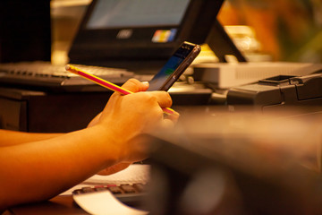 man typing on keyboard