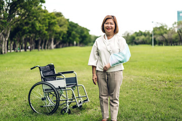 Portrait of happy senior adult elderly asia women smiling and looking at camera in the park.Retirement concept