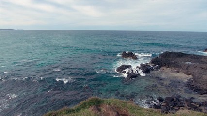 Boulder Beach. Lennox Head Landscape Australia New South Wales. Rocky Boulders & Ocean Views On Sunny Day & Blue Cloudy Sky Over Sea Tide Waves & Coast. Popular Seaside Family Holiday Destination