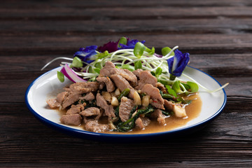 Stir-fried spicy beef with basil
