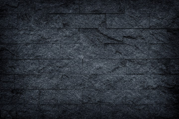 Dark grey stone / black slate stone background or texture