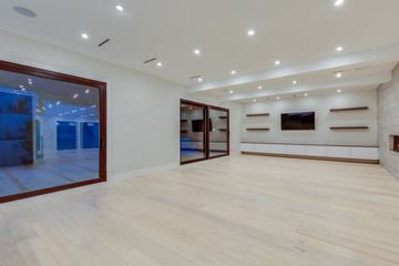 Interior design of a modern living room in the newly built house or apartment, hotel room without furniture