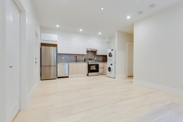 Interior design of a classic living room with kitchen in the newly built house or apartment,...