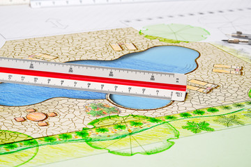 Landscape architect design backyard pool plan with metric scale ruler
