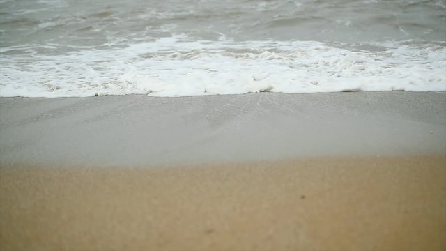 Waves by the coast, beach Diu, India