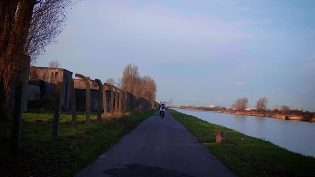Panda driving a Minerva bycicle in 4k