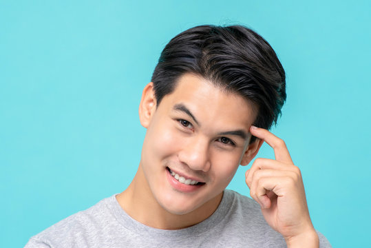 Close Up Of Handsome Asian Man Smiling