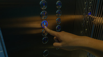 Push the 5th floor in the elevator