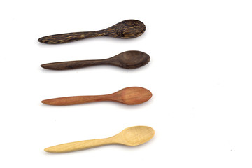 Wooden spoon placed on a white background.