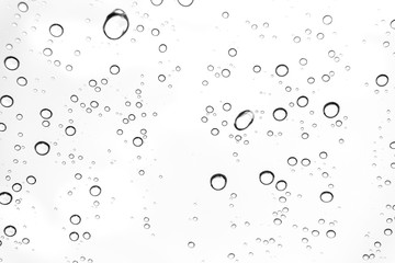 Rain drops on window glasses surface Natural Pattern of raindrops. Natural pattern of raindrops on white background for your design.