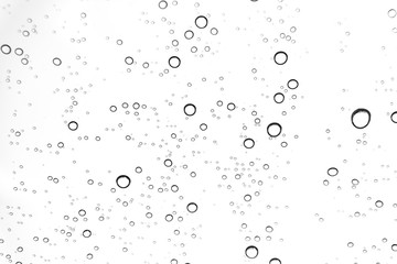 Rain drops on window glasses surface Natural Pattern of raindrops. Natural pattern of raindrops on white background for your design.