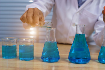 Scientists are experimenting with reagents.To treat the disease in people.