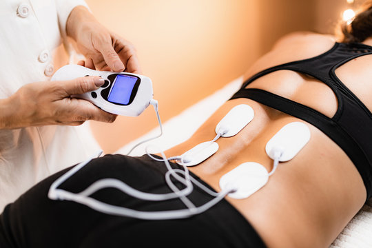 Lower Back Physical Therapy with TENS Electrode Pads, Transcutaneous Electrical Nerve Stimulation