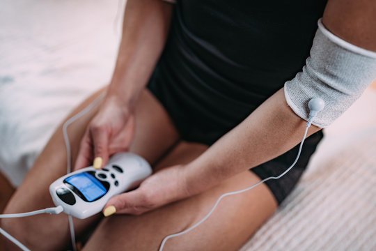 Elbow Physical Therapy with TENS Electrode Brace Pads, Transcutaneous Electrical Nerve Stimulation